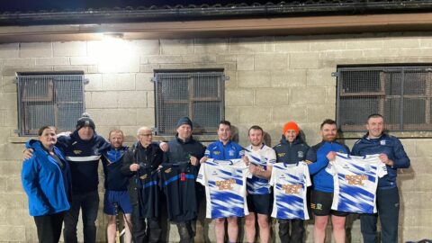 Victorious Junior B team presented with training tops